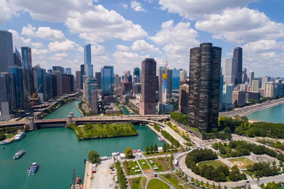 Aerial view of Chicago with river in foreground.